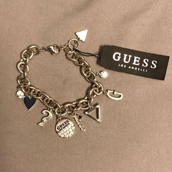 GUESS Silver Charm Bracelet with Black Accents - Picture 1 of 4